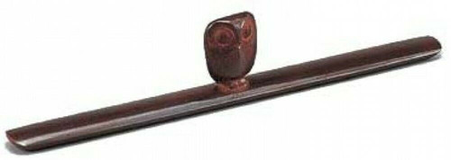 A Takaoka cast-metal bunchin paperweight in an owl motif for calligraphy