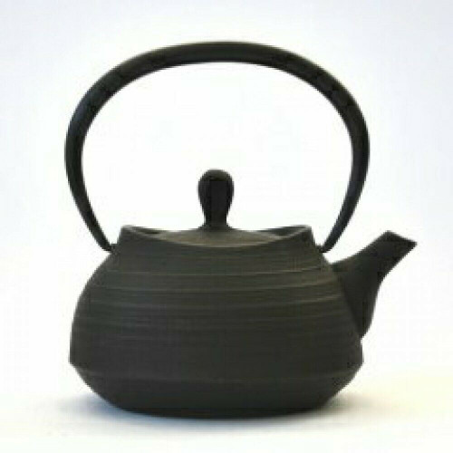 An enameled iron teapot