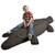 Boy Sitting on Rubber Crocodile