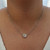 Pear Shape Diamond Sideways Halo Pendant When Worn