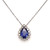 Tanzanite and diamond halo pendant