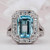 Halo Aquamarine and Diamond Ring
