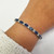 Sapphire and Diamond Tennis Bracelet On Wrist