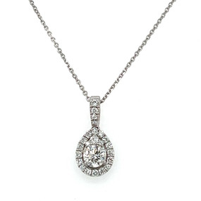 Pear shape halo pendant with round diamond in the middle