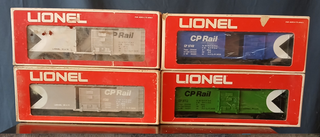 Group of 4 Lionel  traditional size CP rail   box car,s 3 rail