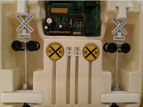 Atlas O (custom signals)  Pair of dual side highway flashers, with RR crossing signs, whistle posts, and circuit board