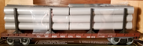 Weaver PRR  50'  flat car with pipe load,  3 rail or 2 rail