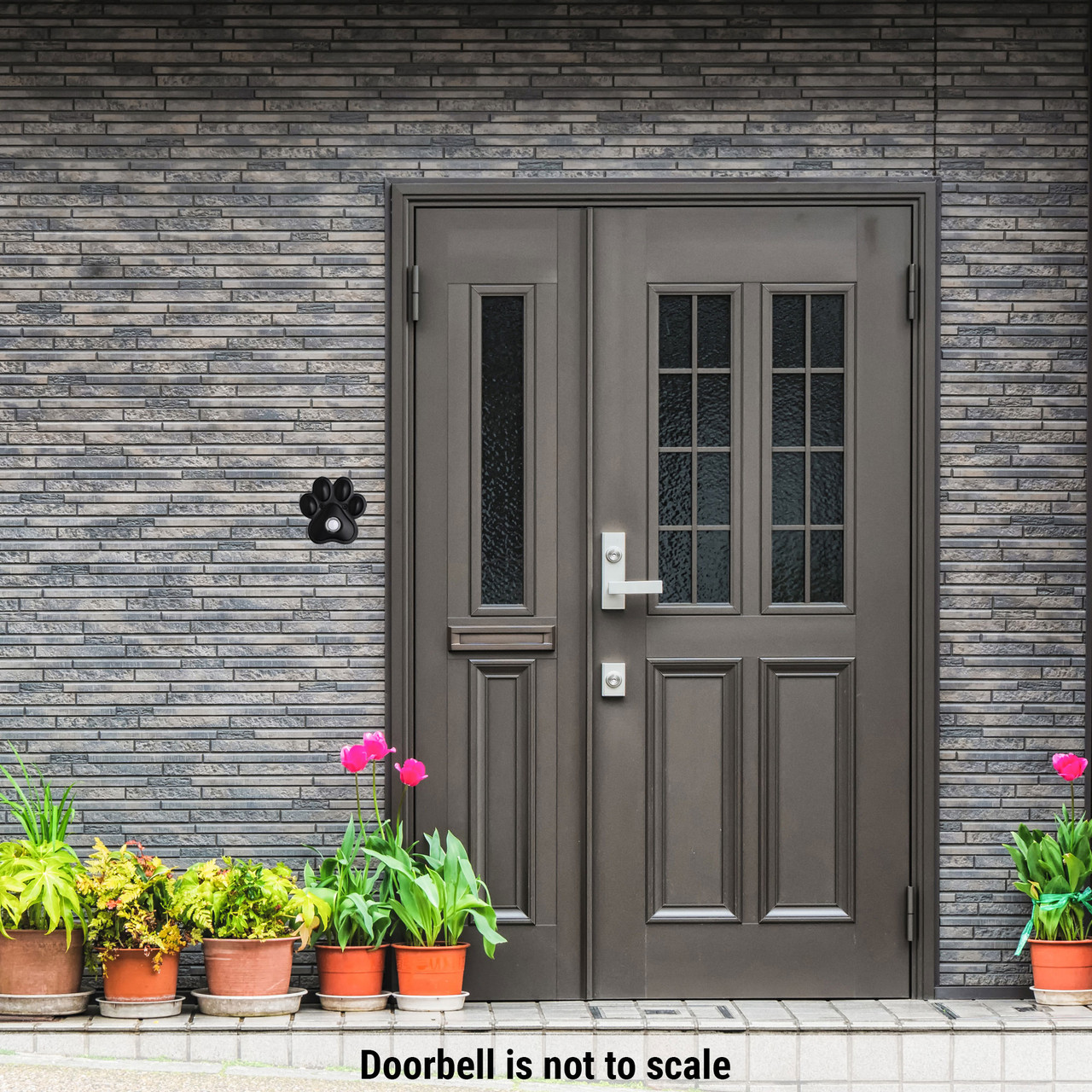 Solid Brass Paw Print Doorbell in Black Waterwood