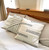 white cotton pillow group on a bed white cotton pillow group on a bed