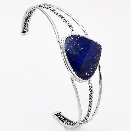 Sterling Silver Lapis Cuff Bangle Bracelet ~

Lapis Lazuli ~ Universal symbol of wisdom and truth. Activates the upper chakras and stimulates the pineal gland. Opens your connection to Spirit.Helps one to develop intuition, psychic visions and clairvoyant abilities. Creates feelings of peace, harmony and the gift of enlightenment.