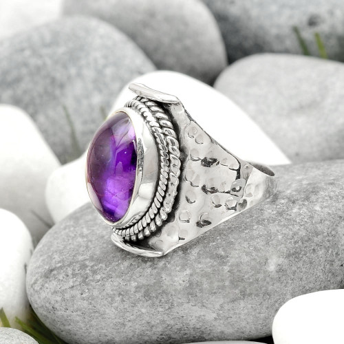 Sterling Silver African Amethyst Ring ~ 

Amethyst ~ The Stone of Tranquility & Psychic Power. Provides peace, balance and a feeling of oneness with your spiritual goals. Heightens intuition, provides protection and healing.