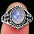 Rainbow Moonstone Small Oval Ring

Rainbow Moonstone ~ A Goddess stone that is associated with the magic of the moon. Most powerful time to use a moonstone is during a full moon. Brings good fortune, success and love. Assists in foretelling the future. Enhances intuition and promotes inspiration. A passionate love stone, stimulating kundalini energy. An excellent stone to use during meditation to understand oneself.