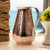 Image shows our elegant Sertodo Bisotun Ayurvedic Copper Water Pitcher adding sophistication to any kitchen or dining area. Your perfect water pitcher.