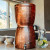 Our Sertodo Sana Vida Ayurvedic Copper Gravity Water Filter System shown in an upscale kitchen.