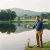 Man posing for the blue ridge mountains before he tosses our Aquasphere Pro