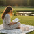Women reads book before her Aquasphere chore
