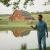Man preparing to put an Aquasphere Pro in his farm's lake