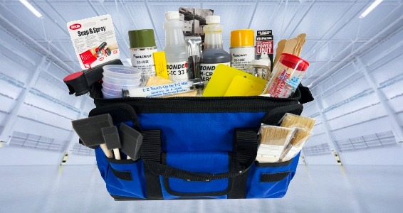 tool bag full of aviation painting supplies