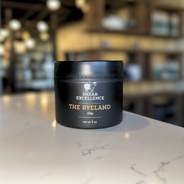 The Romney, a men's hair styling clay, by Shear Excellence, is now available for purchase.