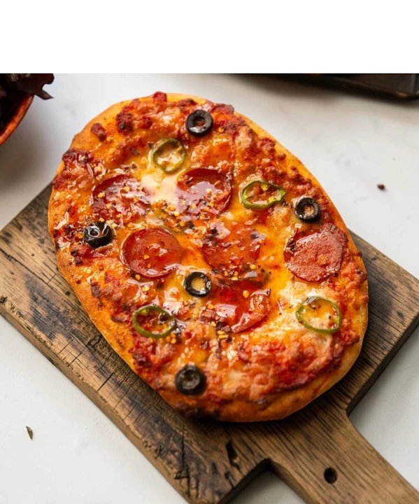 Drizzle a little Calabrese Hot honey on your pizza 