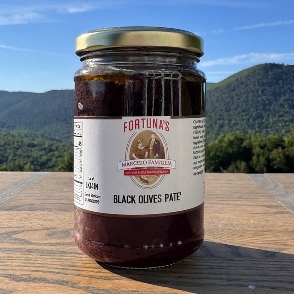 Black olive paté—often called tapenade—is a rich, salty Mediterranean spread made by blending pitted black olives