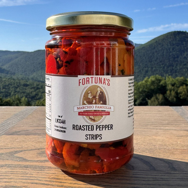 Red roasted Peppers , peel in olive oil
