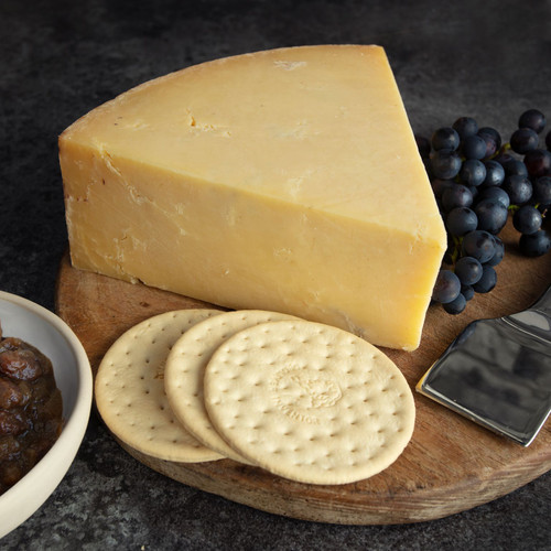 One of the few truly traditional, handmade, organic Cheddars. Produced in Somerset, England. One of the few truly traditional, handmade, organic Cheddars. Produced in Somerset, England.