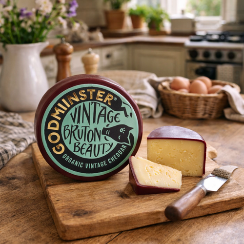 Godminster Cheddar 1kg Truckle on kitchen table
