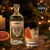 a bottle of copas gin on a festive table