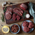 Different cuts of beef and mince on a wooden board