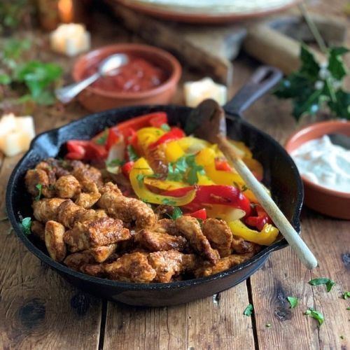 person standing with a cow