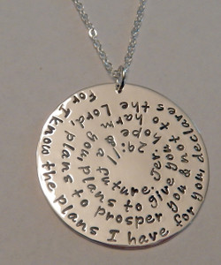 Jeremiah 29:11 Bible Verse Necklace Extra Large Sterling Silver Round Hand Stamped with choice of chain. It is shown with a Polished Finish on a Solid Sterling Silver Cable Chain. Choose from five custom finish options. Use the drop down menu if you would like to add Genuine Swarovski Birthstones. 
 
Jeremiah 29:11
For I know the plans I have for you, declares the Lord, plans to prosper you and not to harm you, plans to give you hope and a future.
 
SIZE:
Solid Sterling Silver 1 1/2" Round