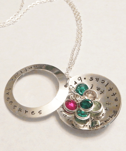 Auntie's, Mommy's, Grandma's, Nana, or Little Treasures Sterling Silver Locket Style Necklace Multiple Names Spiral Stamped & Swarovski Birthstone Necklace and choice of chain. It is shown with a Polished Finish on a Solid Sterling Silver Cable Chain. Choose from five custom finish options. One Birthstone is included. Use the drop down menu if you would like to add Genuine Swarovski Birthstones. 
*Note-"Little Treasures" is the default text that will be stamped if no other text is requested on the outside washer.

SIZE: 
Solid Sterling Silver 1 1/4" Round Domed
Solid Sterling Silver 1 1/4" Washer Domed
One Genuine Swarovski Crystal Birthstone choice