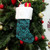 Samoa Christmas Stocking Design Stretch Print Fabric Turquoise