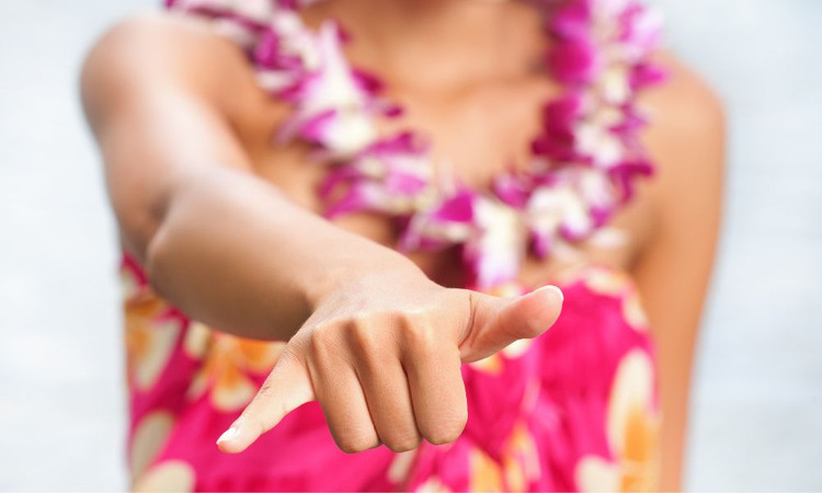 The Dark History of Hawai‘i’s Iconic Hand Gesture
