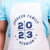 White polyester apron with a fixed neck loop and tie waist for a comfortable, adjustable fit