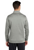 model wearing Sport-Tek ® PosiCharge ® Sport-Wick ® Heather Fleece 1/4-Zip Pullover facing back