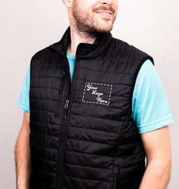 Custom puff vest with embroidery options for personalized designs on the left chest.