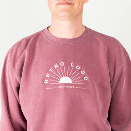 Custom embroidered pigment-dyed crewneck made from a soft cotton/polyester blend with a 100% cotton face.