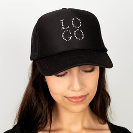 Custom trucker cap with rhinestone design on front panel and mesh back for breathable comfort