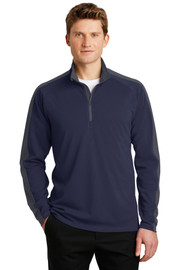 Model wearing Sport-Tek® Sport-Wick® Textured Colorblock 1/4-Zip Pullover in navy front