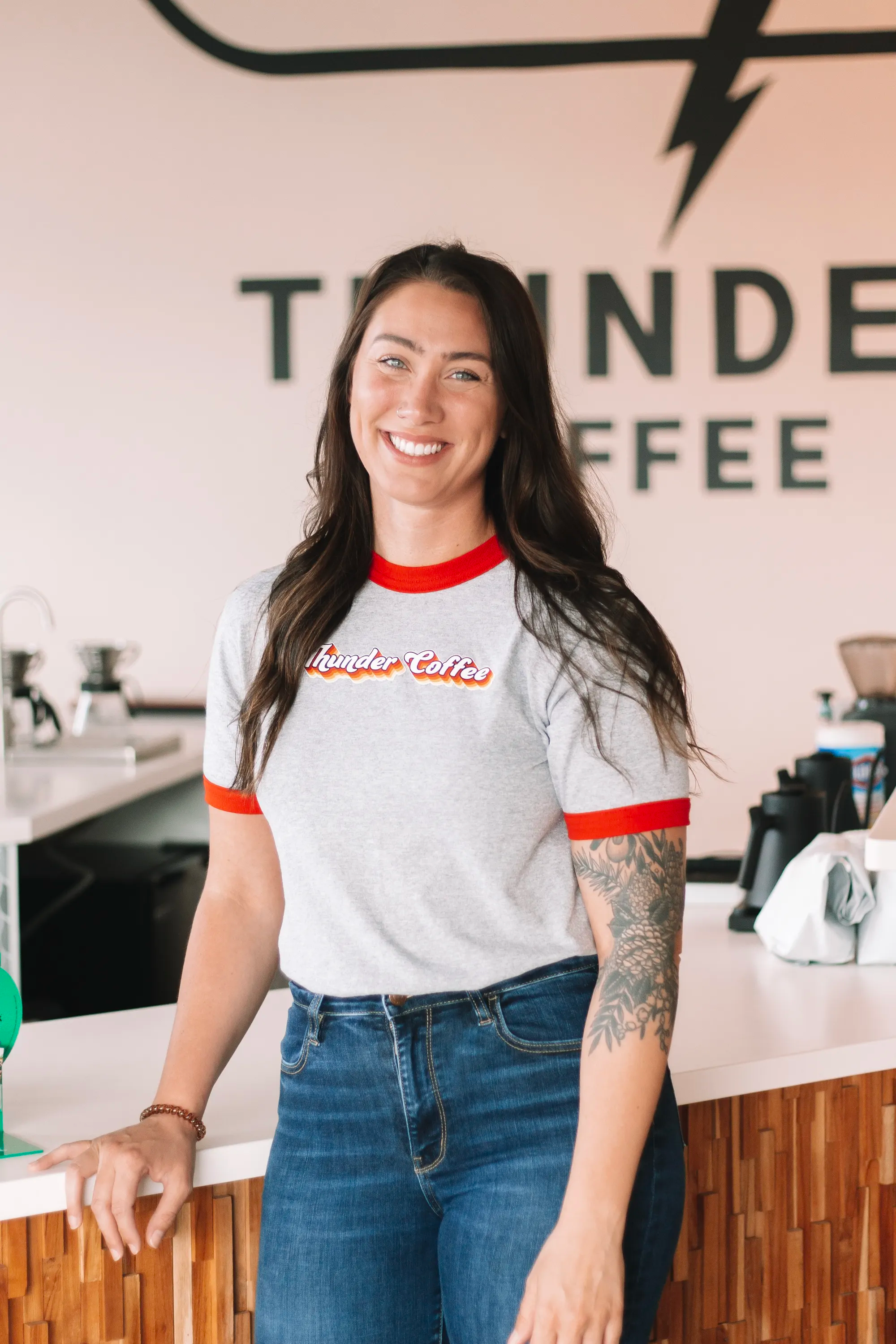 Woman wearing Thunder Coffee t-shirt