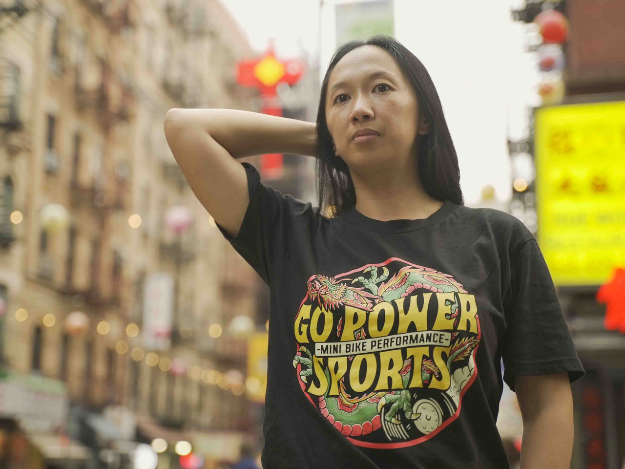 Draggin' Shirt (DRAGGIN) on a female model in Chinatown, NYC.