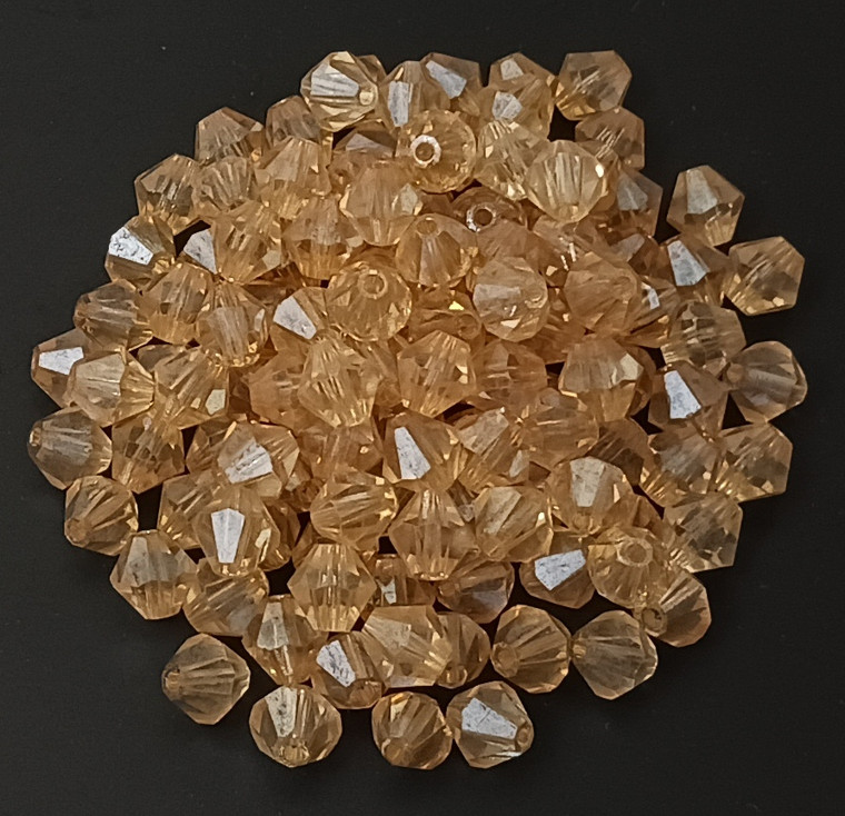 1 Dozen Preciosa 6mm Bicones - Champagne Luster