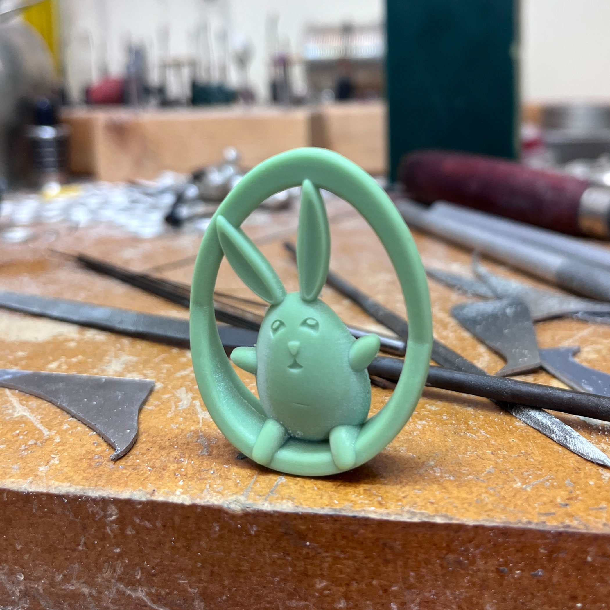 green resin model of a wobble bunny