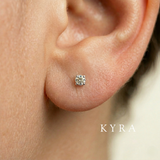 Natural 3mm Diamond Solitaire set in 14K WG Ear Stud on adult ear-lobe