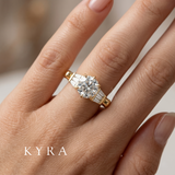 Six Prong Round Brilliant & Baguette Engagement Ring on finger