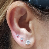 7mm Round CZ Ear Studs in Medical Grade Surgical Steel on ear