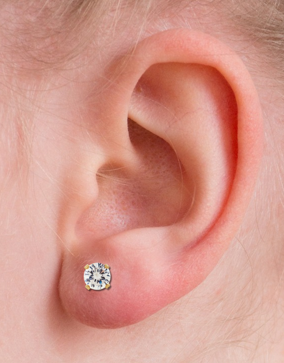 5mm CZ set in Solid Yellow Gold on ear