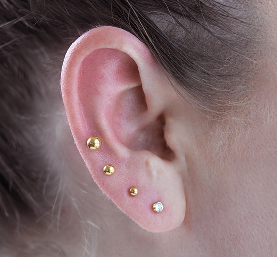 4mm Plain Ball Ear Stud Rose Gold Plated on adult ear lobe
